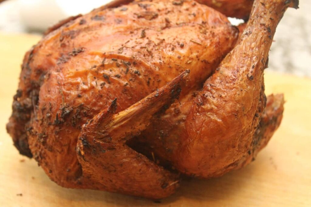 Roasted chicken rich in amino acids that support collagen—one of the collagen-boosting foods that make you younger.