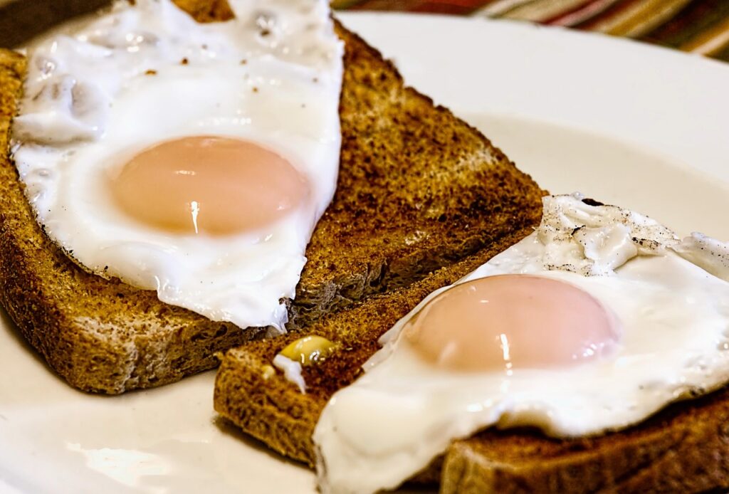 fried eggs on pieces of bread