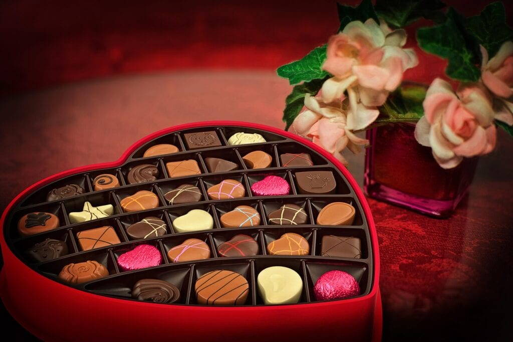 heart shaped box full of chocolate candy