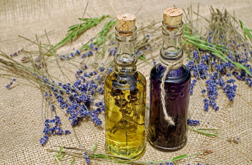 two small bottles filled with oil