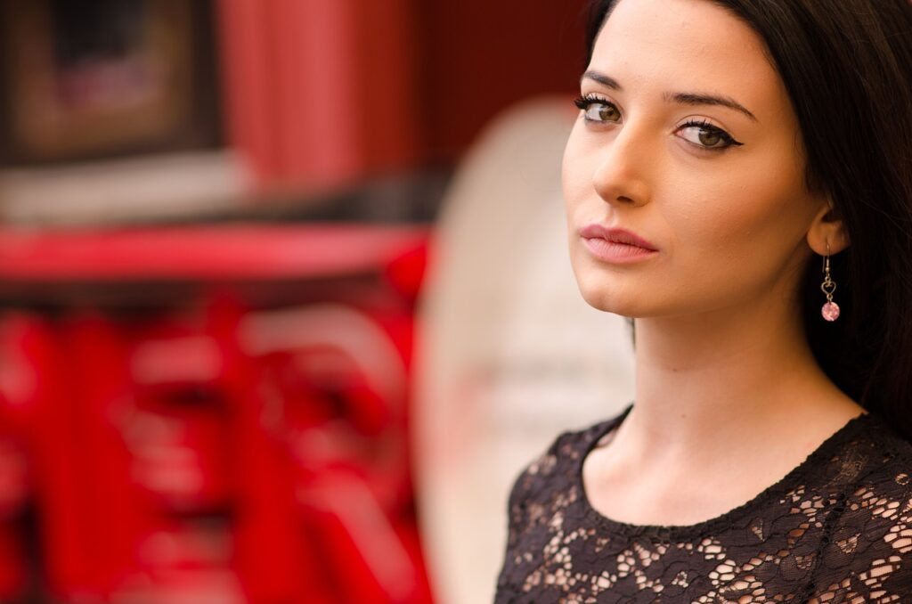 woman with black hair and black dress
