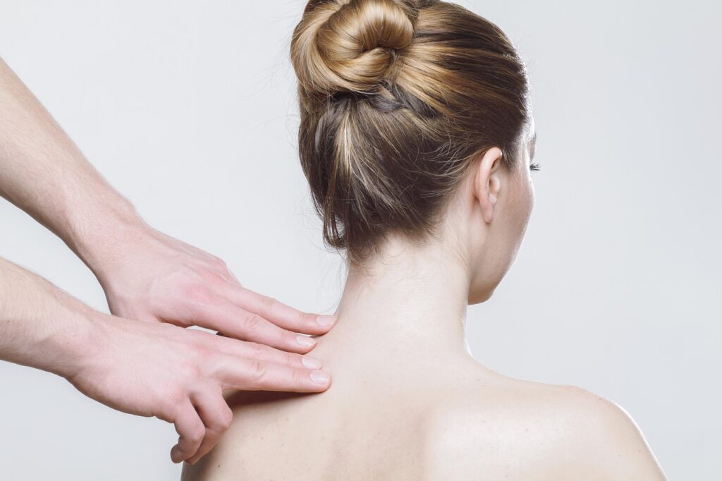 woman getting massaged on her back