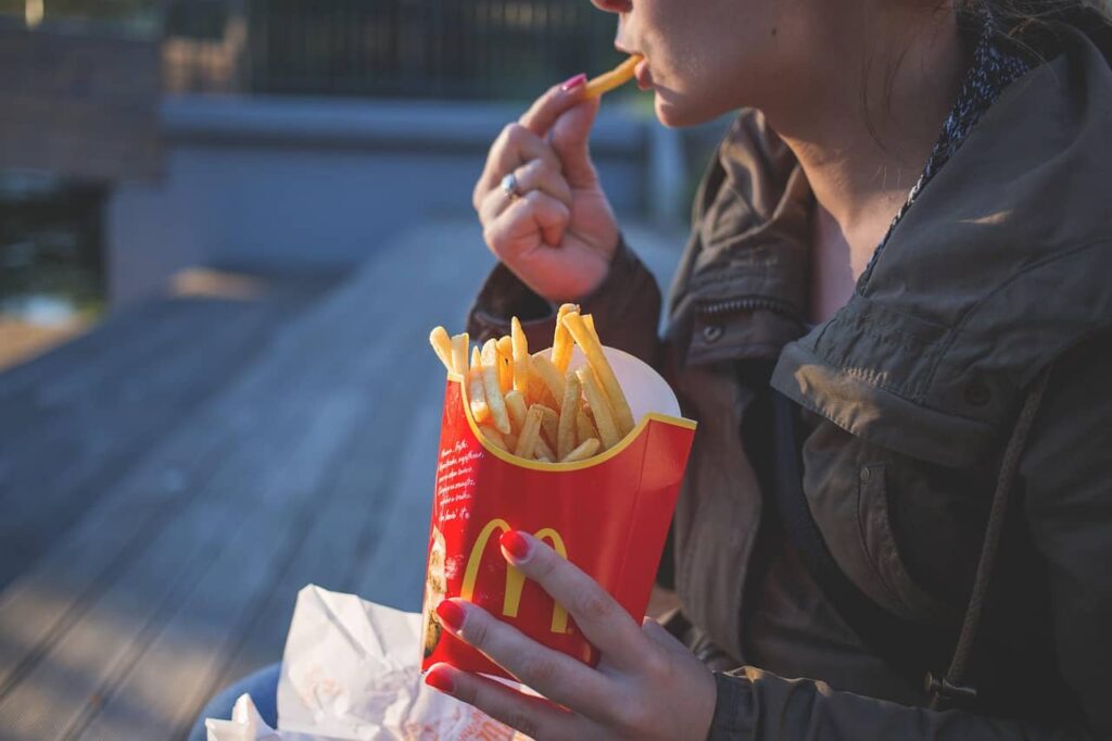 one of the mistakes of nail mistakes that stop growth is eating too much fast food